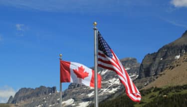 American and Canadian flags